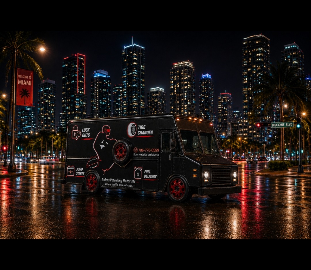 RPM Roadside stepvan patrolling Miami at night with the city skyline behind it